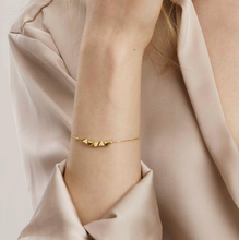 Load image into Gallery viewer, ARMONICA BRACELET 241303/006 GOLD ROW OF HEARTS